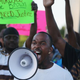 Demonstrators protest the killing in Ferguson, Mo., of teenager Michael Brown Aug. 12, 2014.
Scott Olson/Getty Images